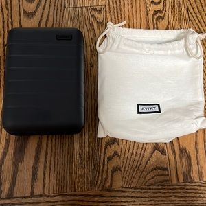 Navy AWAY travel bag hard body. Never been used. Like new.